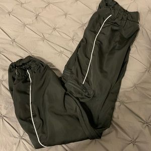 Tapered bottom jogger pants with zippers